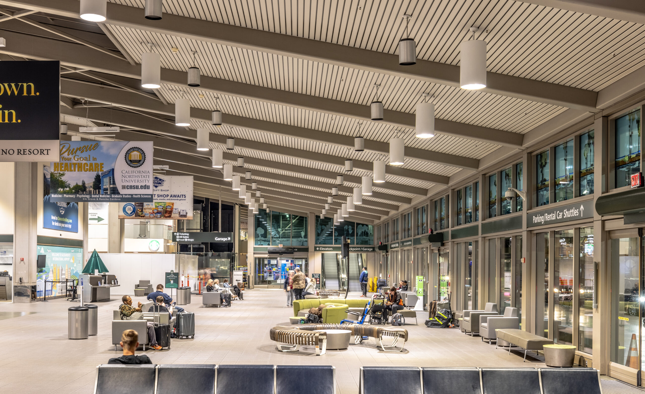 Filamento lights used for high ceiling Sacramento Airport, increasing LED output, reducing glare, and increasing efficiency.